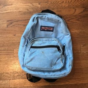 Blue corduroy Jansport backpack